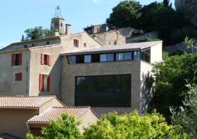 Surélévation de maison en ossature légère métallique en coeur de ville après habillage